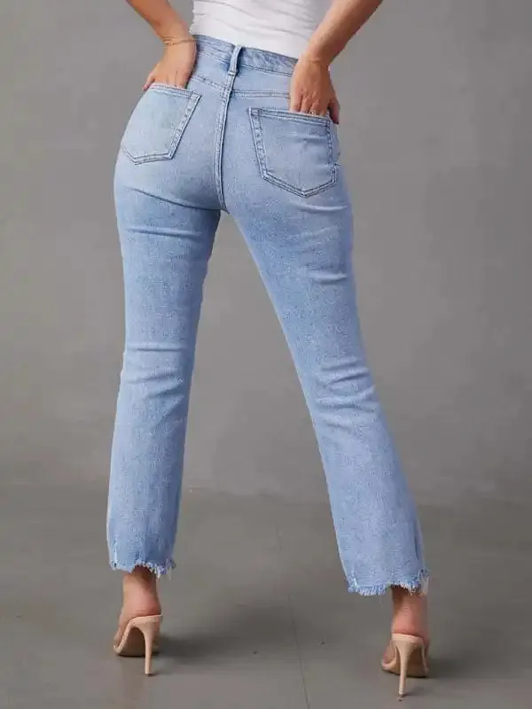 Women’s plain distressed light colored casual jeans